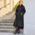 34507 black hooded full-length coat with tonal leopard panels, a self-tie belt, two-way front zipper and balloon hem